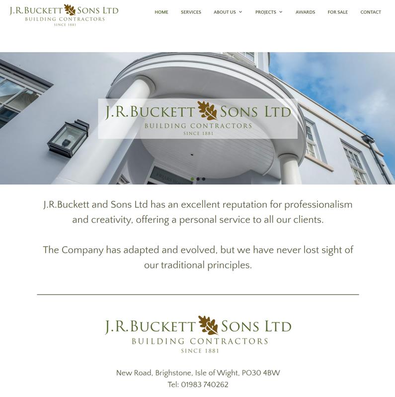 Home page of JR Buckett & Sons website, showing an upmarket building frontage in white.